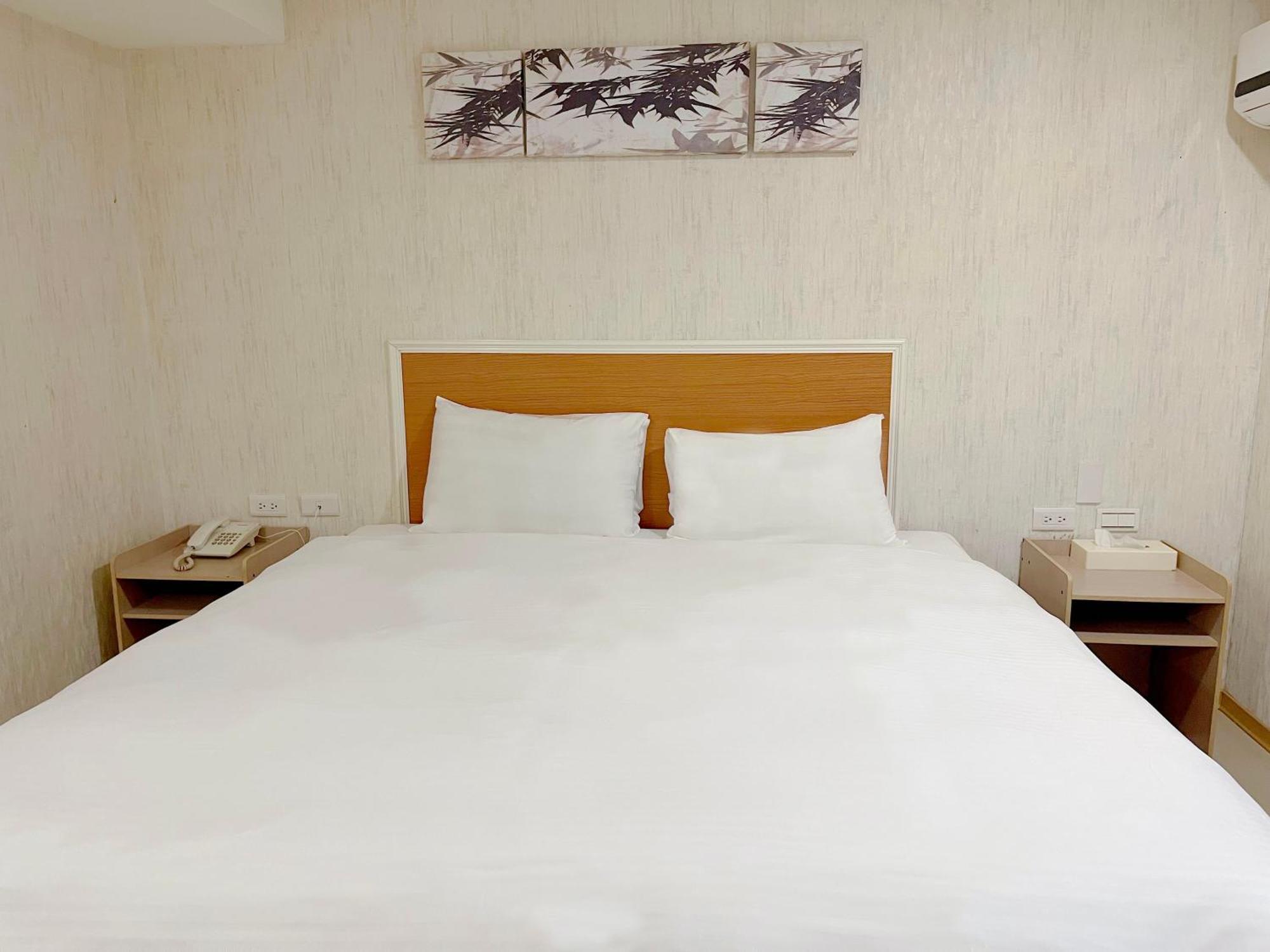 E Lim Hotel Csungli Szoba fotó